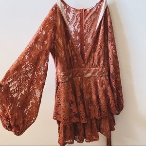 Rust sheer lace romper with nude underlay